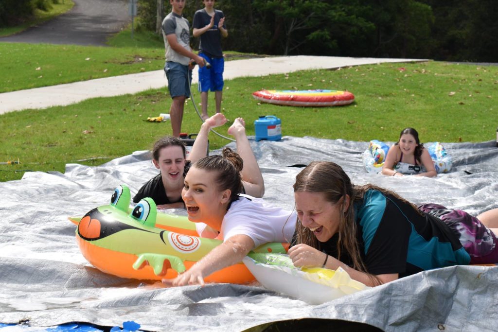 youth youth having fun on a slide